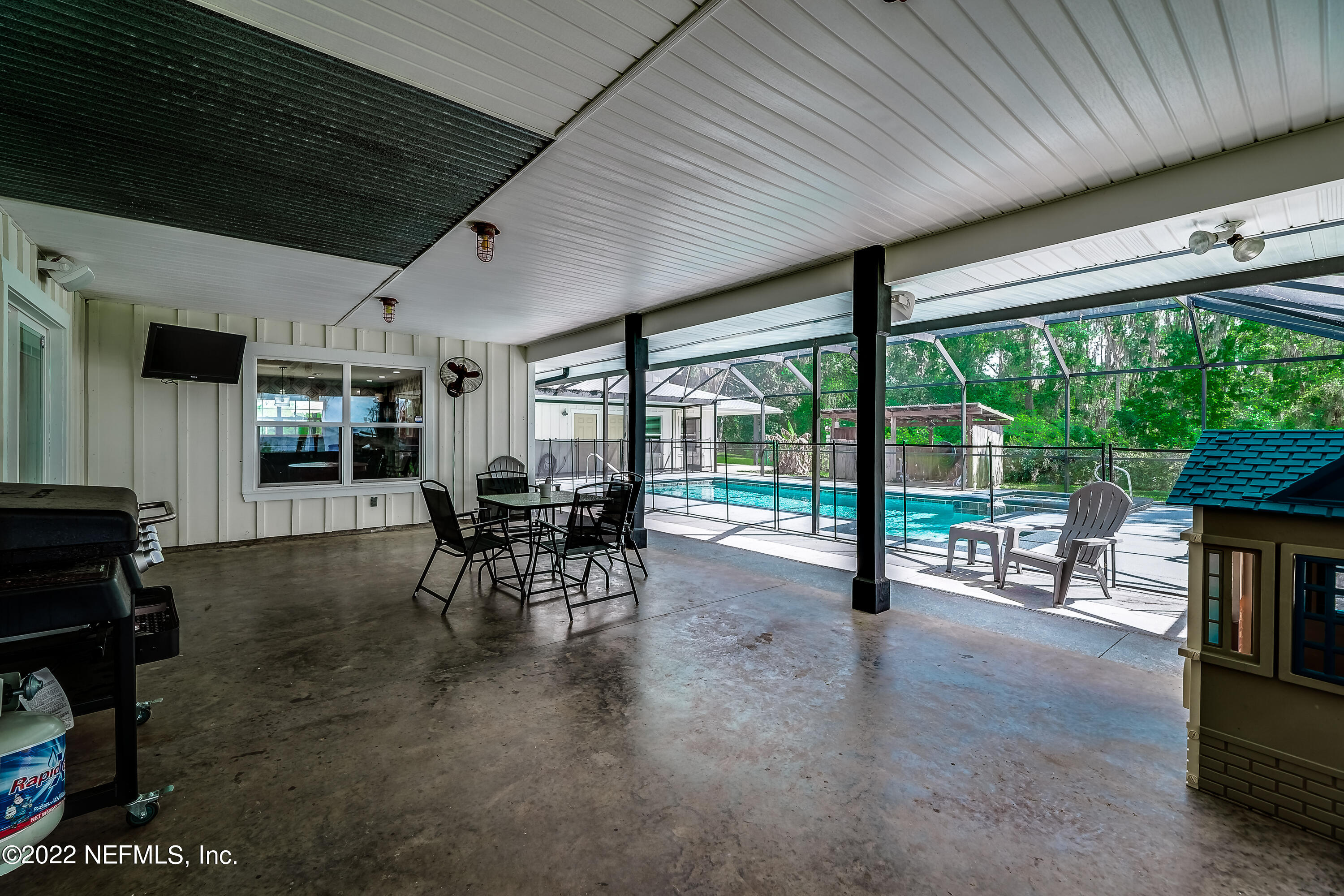 541 Federal Point Road East Palatka, FL 32131 - Photo 42 of 75 a dining room with furniture water view and a large window