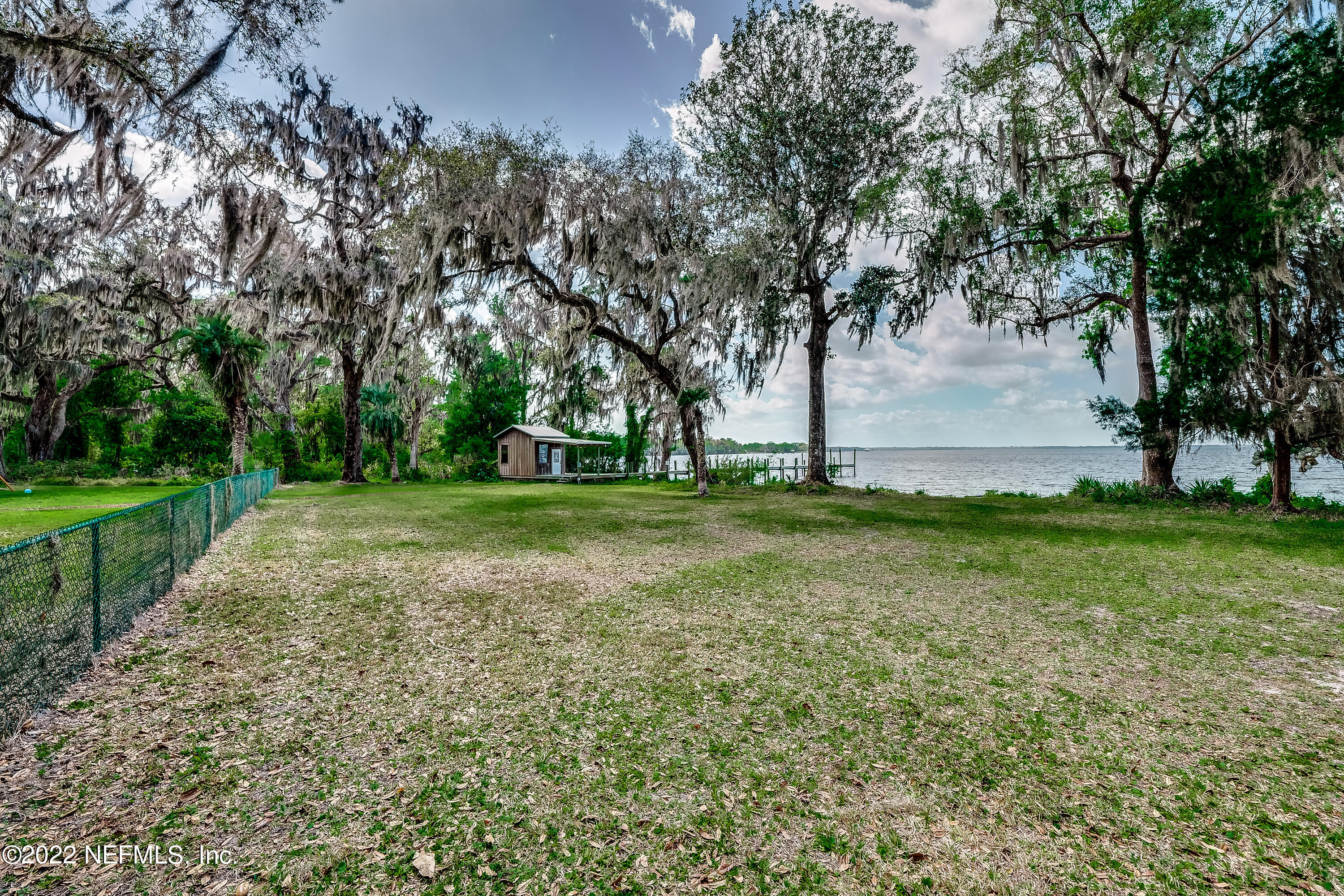 541 Federal Point Road East Palatka, FL 32131 - Photo 46 of 75 a view of a garden with large trees