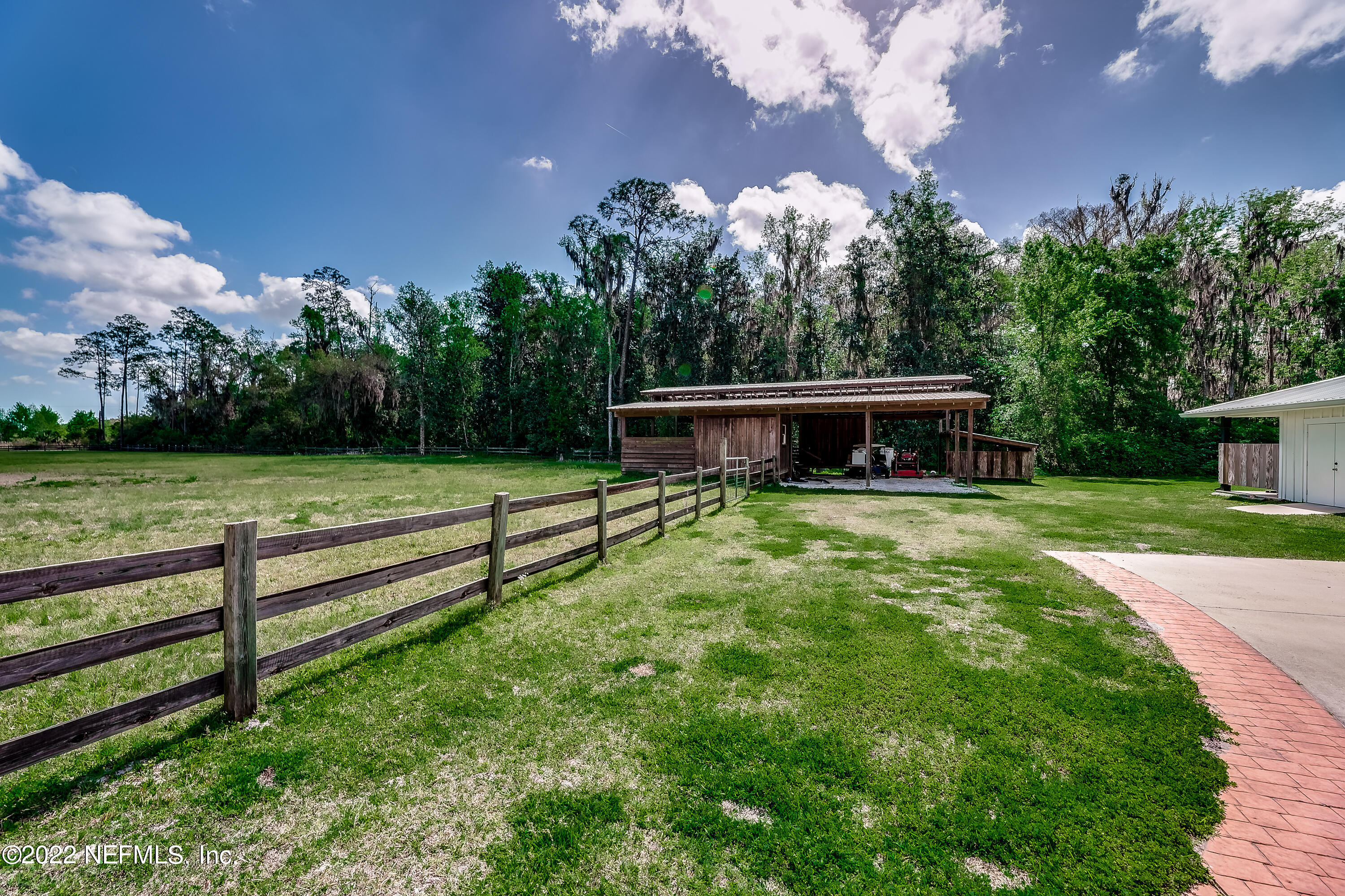 541 Federal Point Road East Palatka, FL 32131 - Photo 69 of 75 a front view of a house with garden