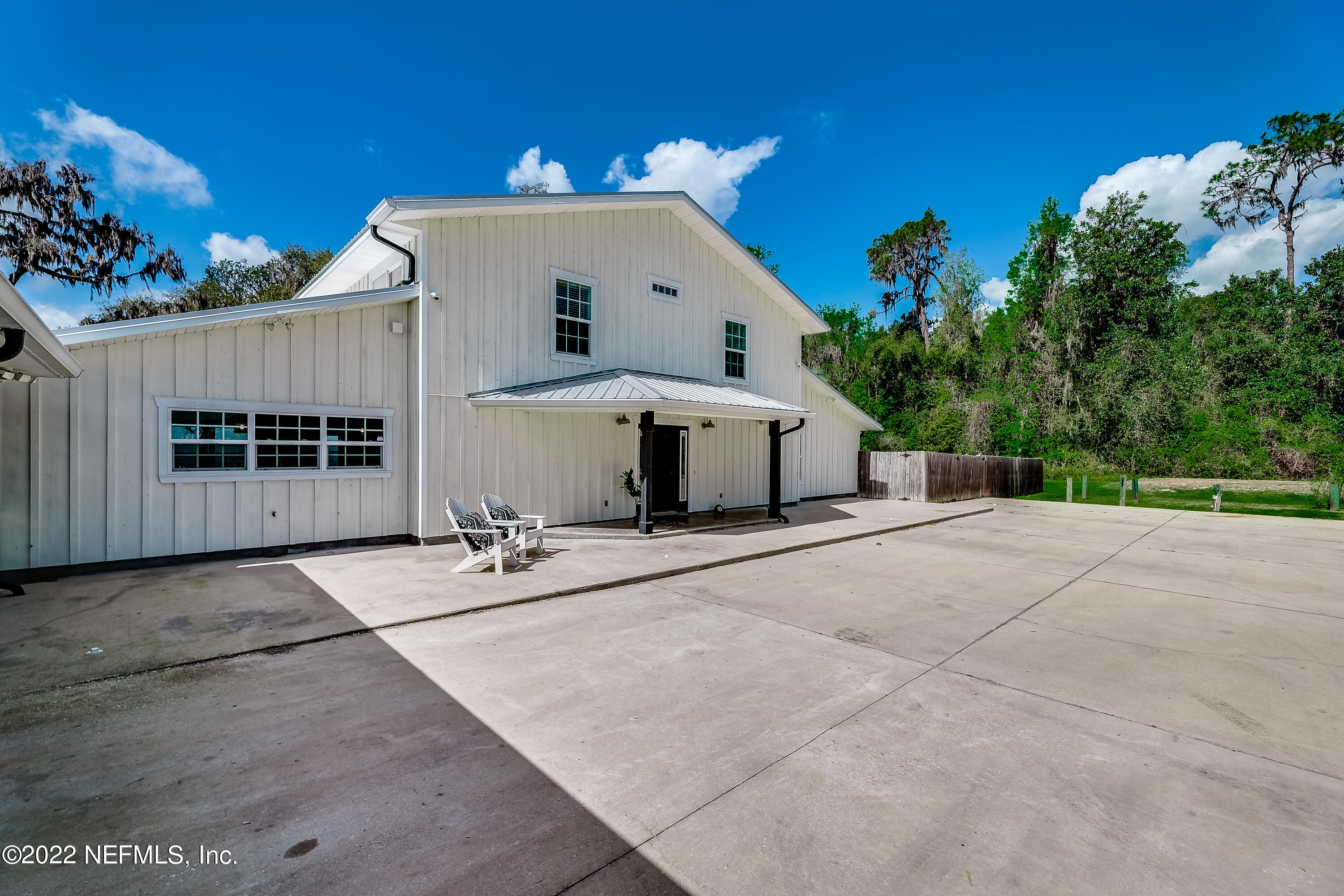 541 Federal Point Road East Palatka, FL 32131 - Photo 7 of 75 a front view of a house with a yard