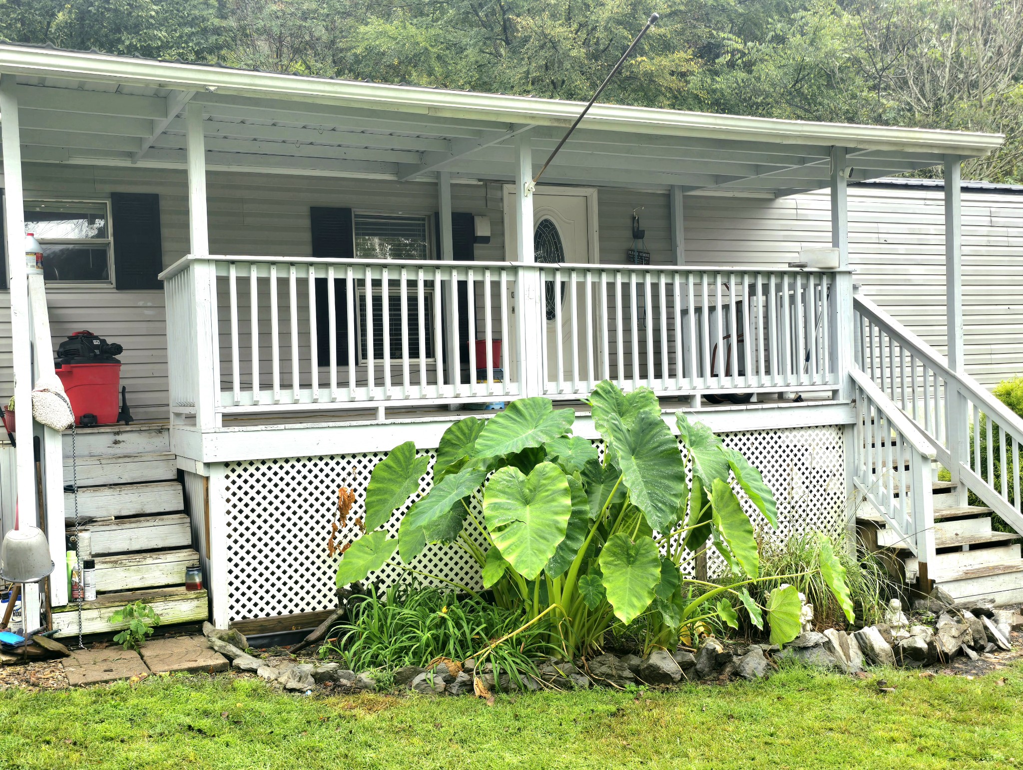157 Longbranch Road Hohenwald, TN 38462 - Photo 6 of 16 a view of a chair in the patio
