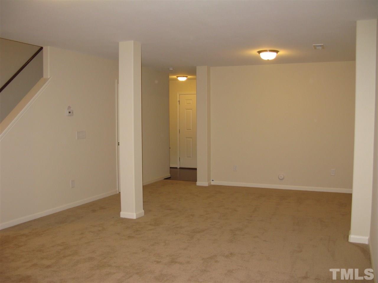 6833 Planting Court Raleigh, NC 27610 - Photo 4 of 18 a view of an empty room