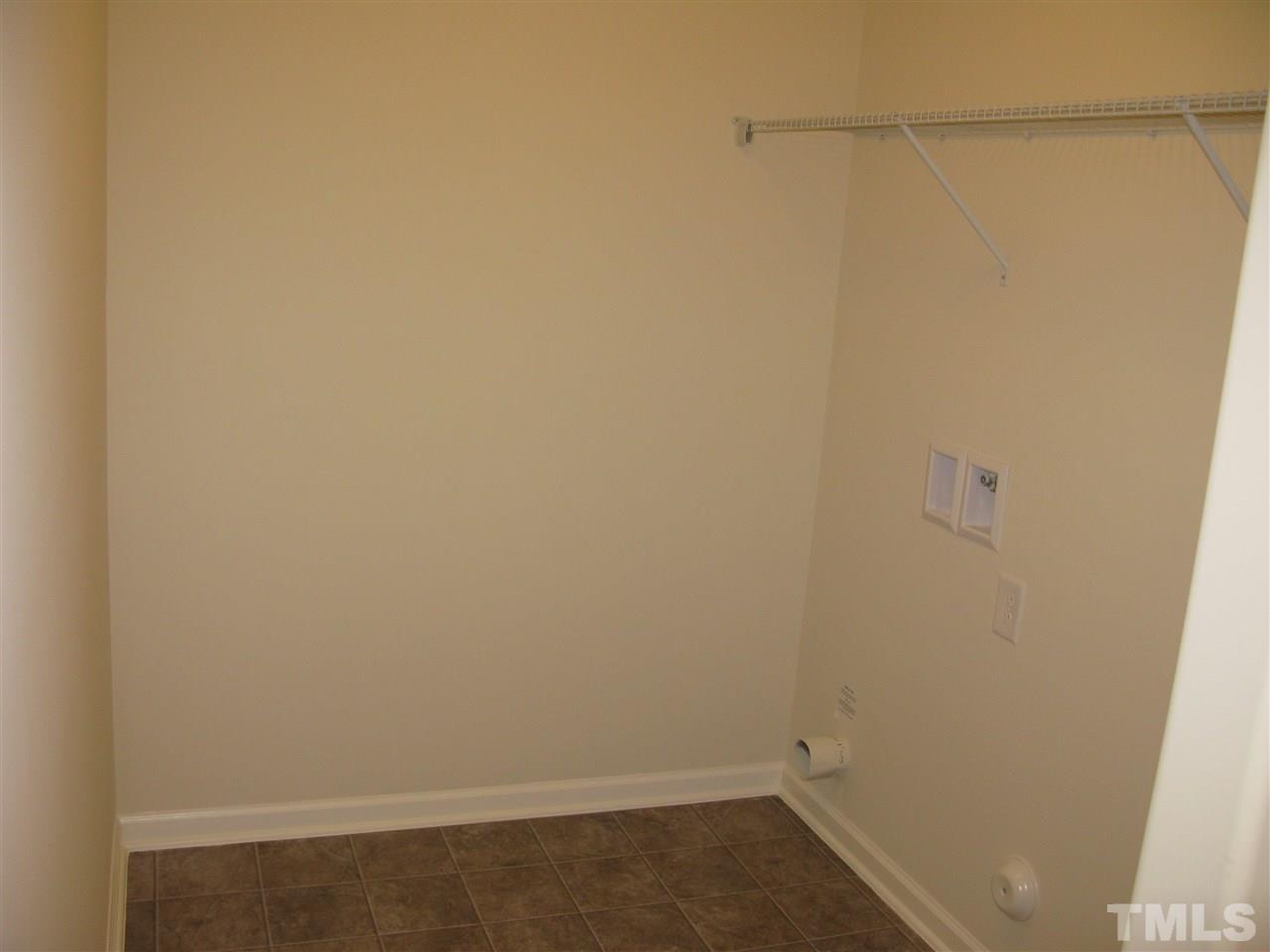 6833 Planting Court Raleigh, NC 27610 - Photo 6 of 18 a view of an empty room