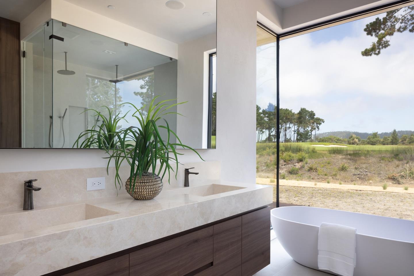31 Poppy Lane Pebble Beach, CA 93953 - Photo 21 of 45 a bathroom with a tub shower and sink