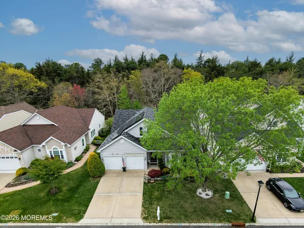 an aerial view of a house with a garden