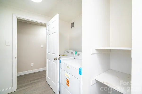 a storage room with a sink