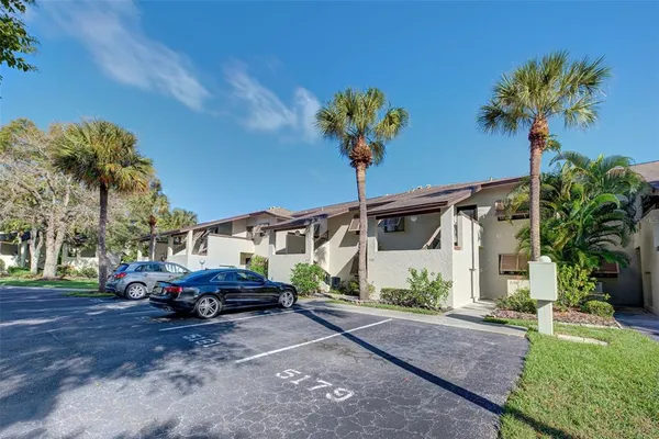 a cars parked in front of a house