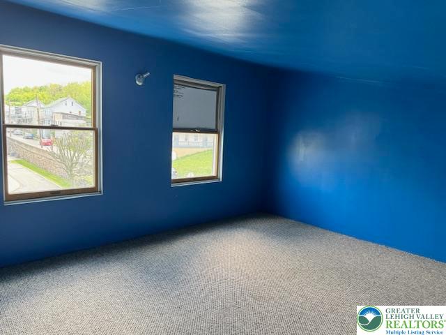 32 Powell Street Lansford, PA 18232 - Photo 6 of 12 an empty room with windows