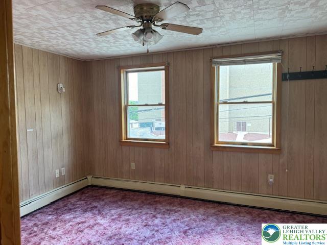 32 Powell Street Lansford, PA 18232 - Photo 9 of 12 a view of an empty room with a window and wooden floor