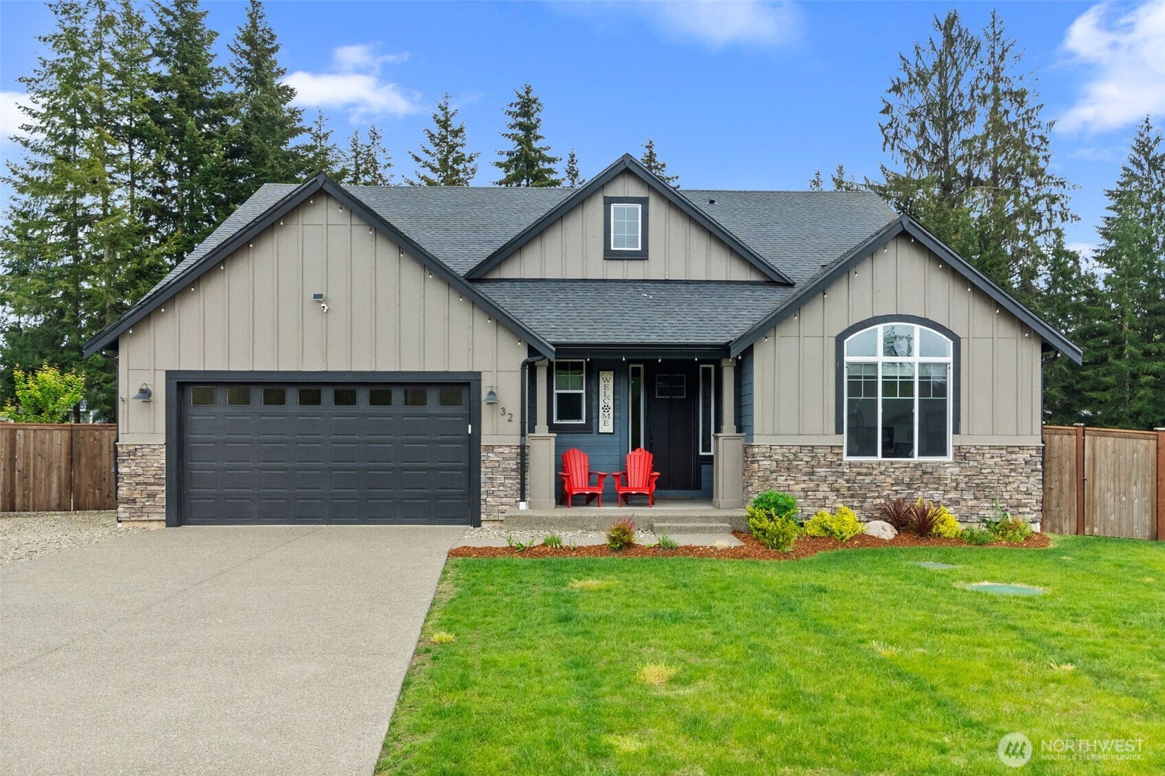 32 Coyote Road Montesano, WA 98563 - Photo 1 of 37 a front view of house with yard