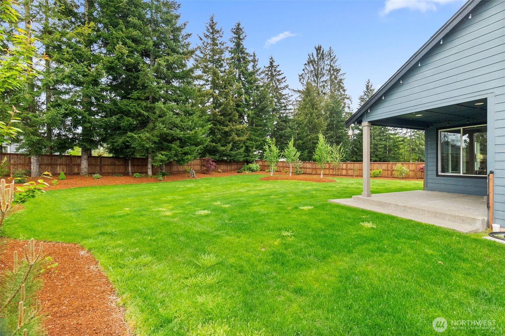 32 Coyote Road Montesano, WA 98563 - Photo 30 of 37 a view of a house with a backyard