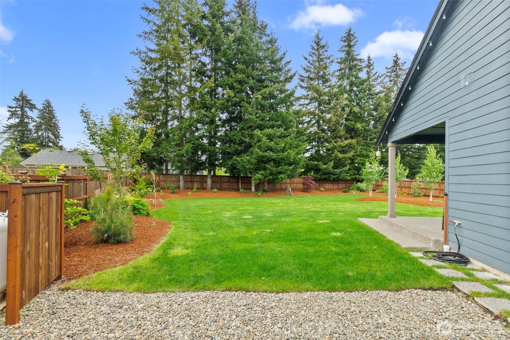 32 Coyote Road Montesano, WA 98563 - Photo 31 of 37 a view of a backyard with a garden