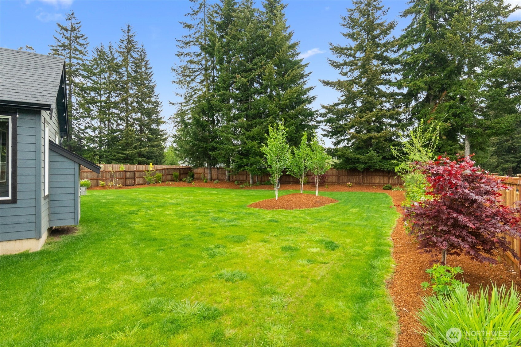 32 Coyote Road Montesano, WA 98563 - Photo 35 of 37 a view of a backyard with a garden