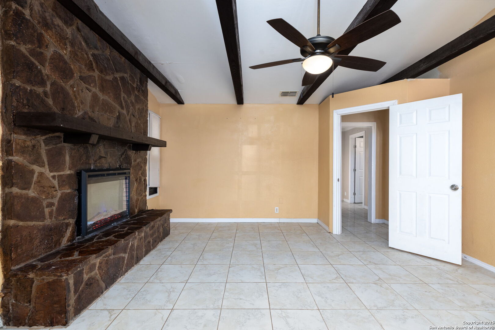 13934 Interstate 35 Moore, TX 78057 - Photo 19 of 29 a view of an empty room with a fireplace