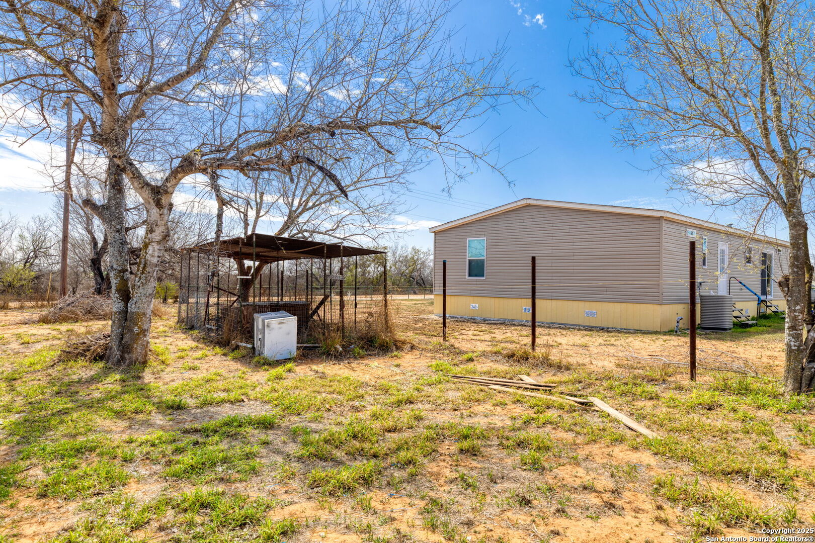 13934 Interstate 35 Moore, TX 78057 - Photo 25 of 29 a view of a backyard of the house