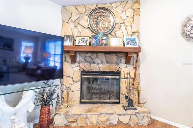 a fireplace with a clock on top of it