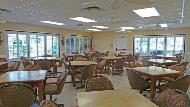 a view of outdoor space with garden and signage