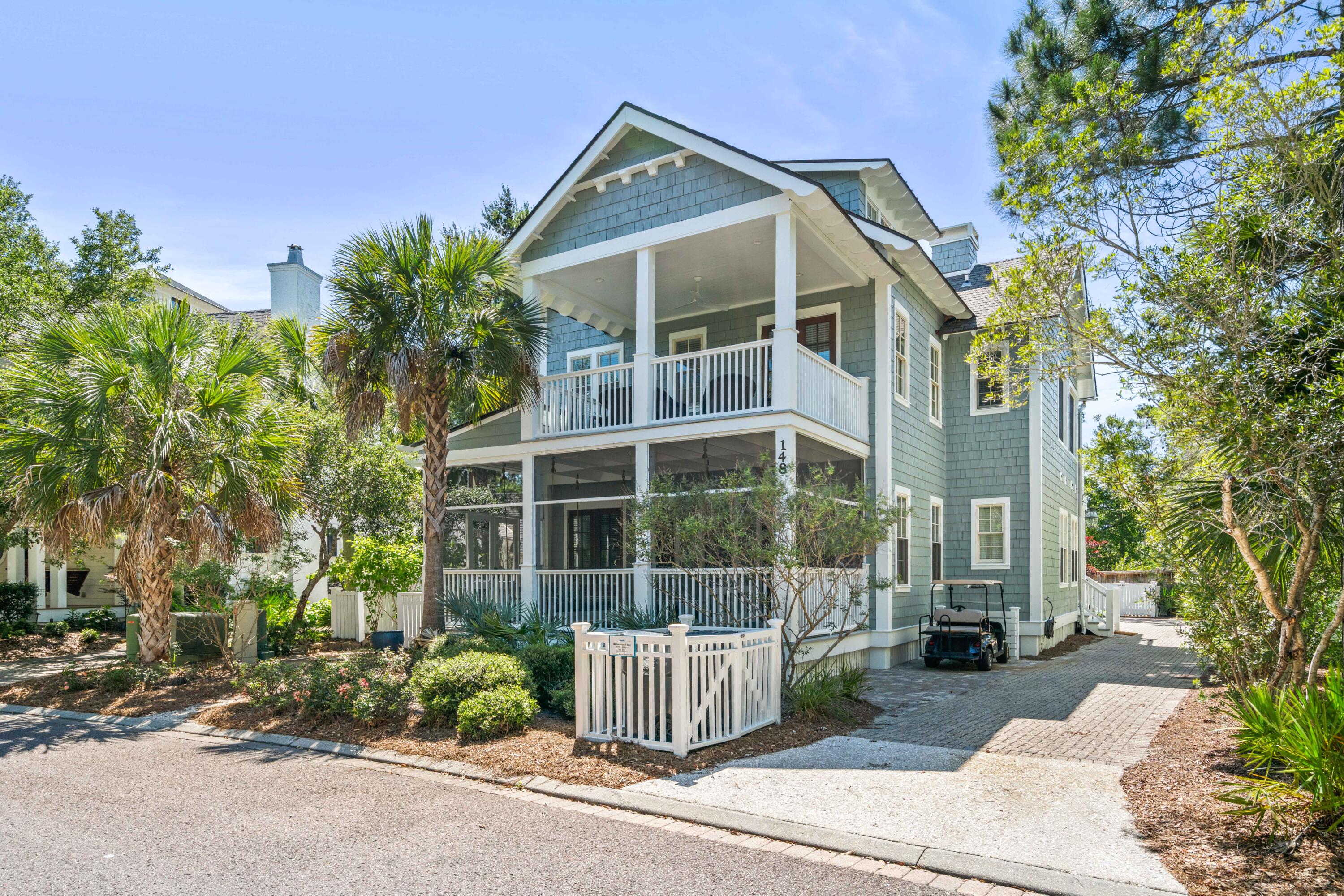 148 Coopersmith Lane Inlet Beach, FL 32461 - Photo 67 of 82 a front view of a house with a garden