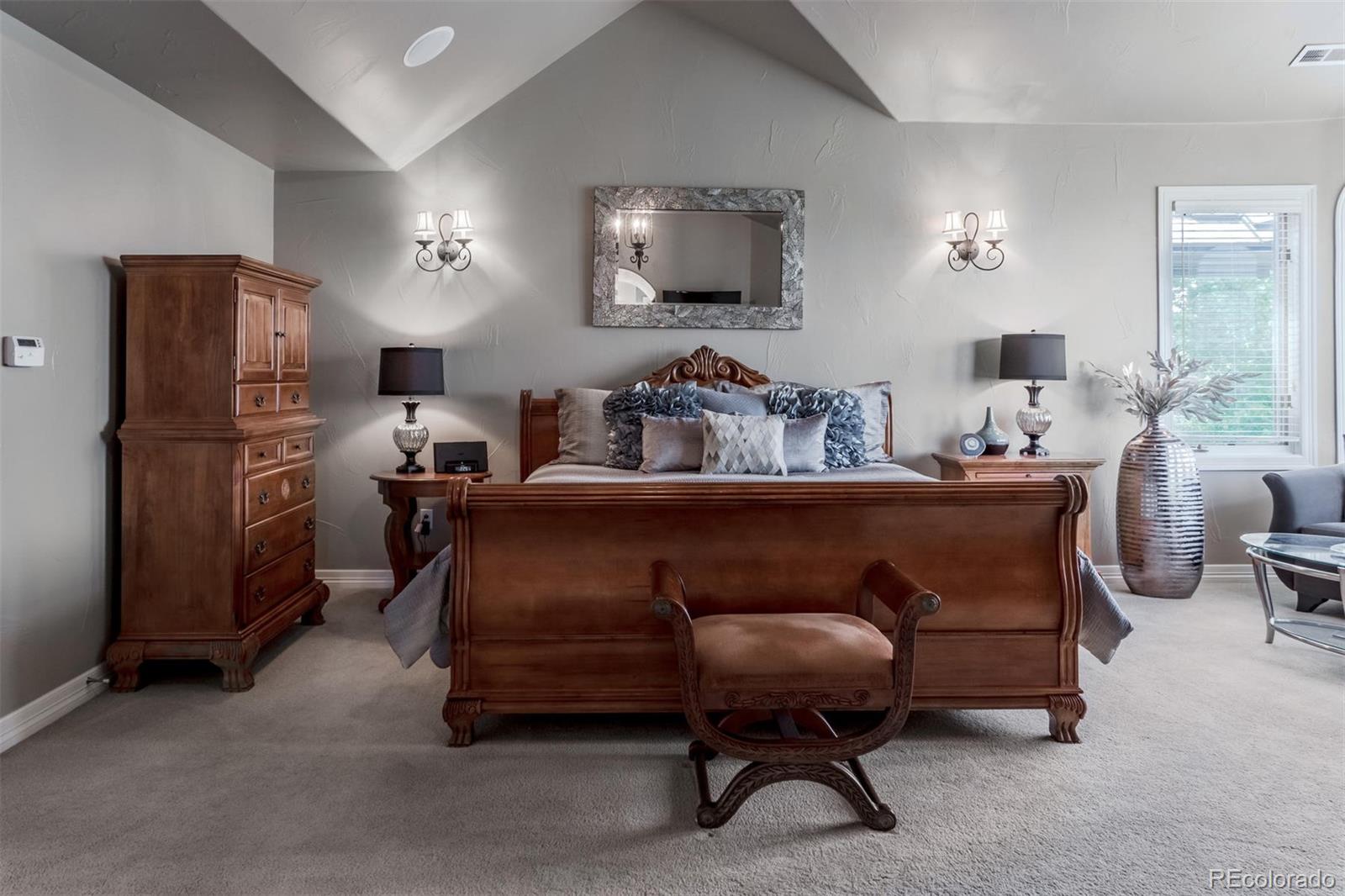 2671 Ranch Reserve Ridge Westminster, CO 80234 - Photo 13 of 35 a living room with furniture and a refrigerator