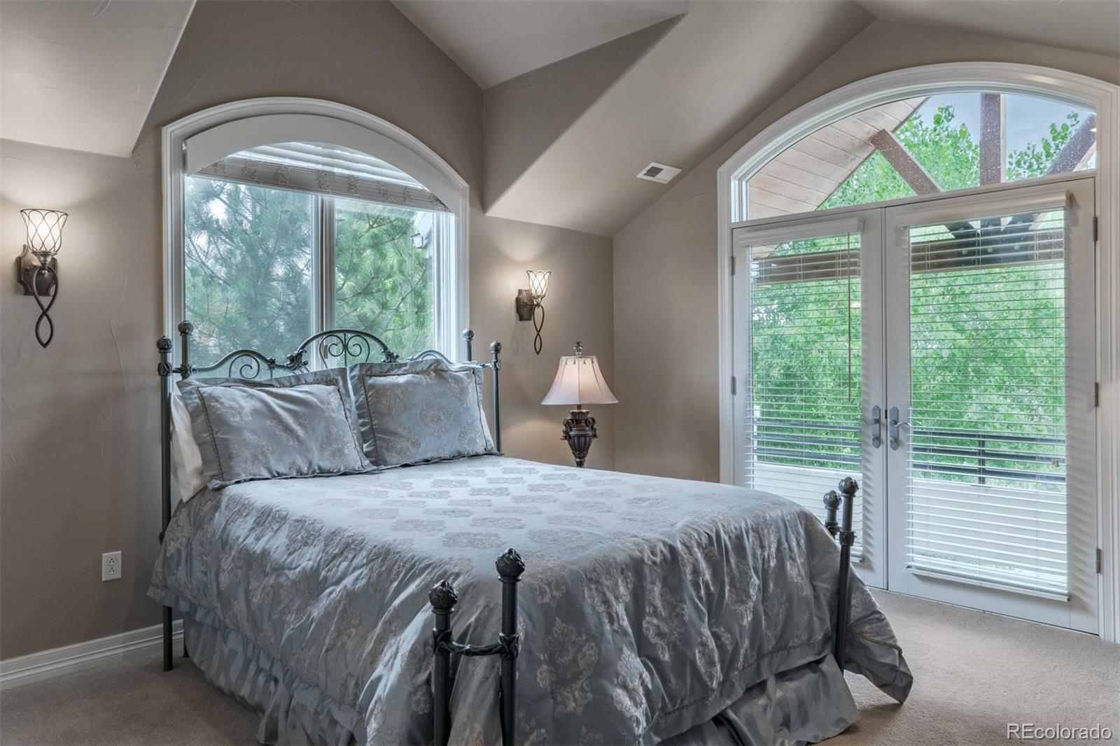 2671 Ranch Reserve Ridge Westminster, CO 80234 - Photo 22 of 35 a bedroom with a bed and a large window