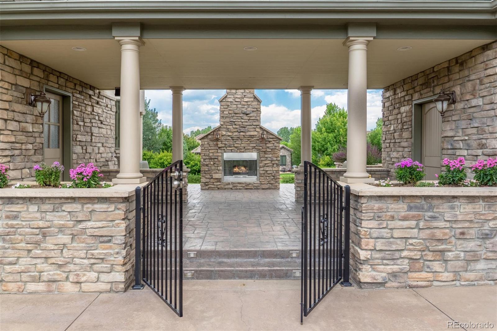 2671 Ranch Reserve Ridge Westminster, CO 80234 - Photo 34 of 35 a front view of a house with a porch