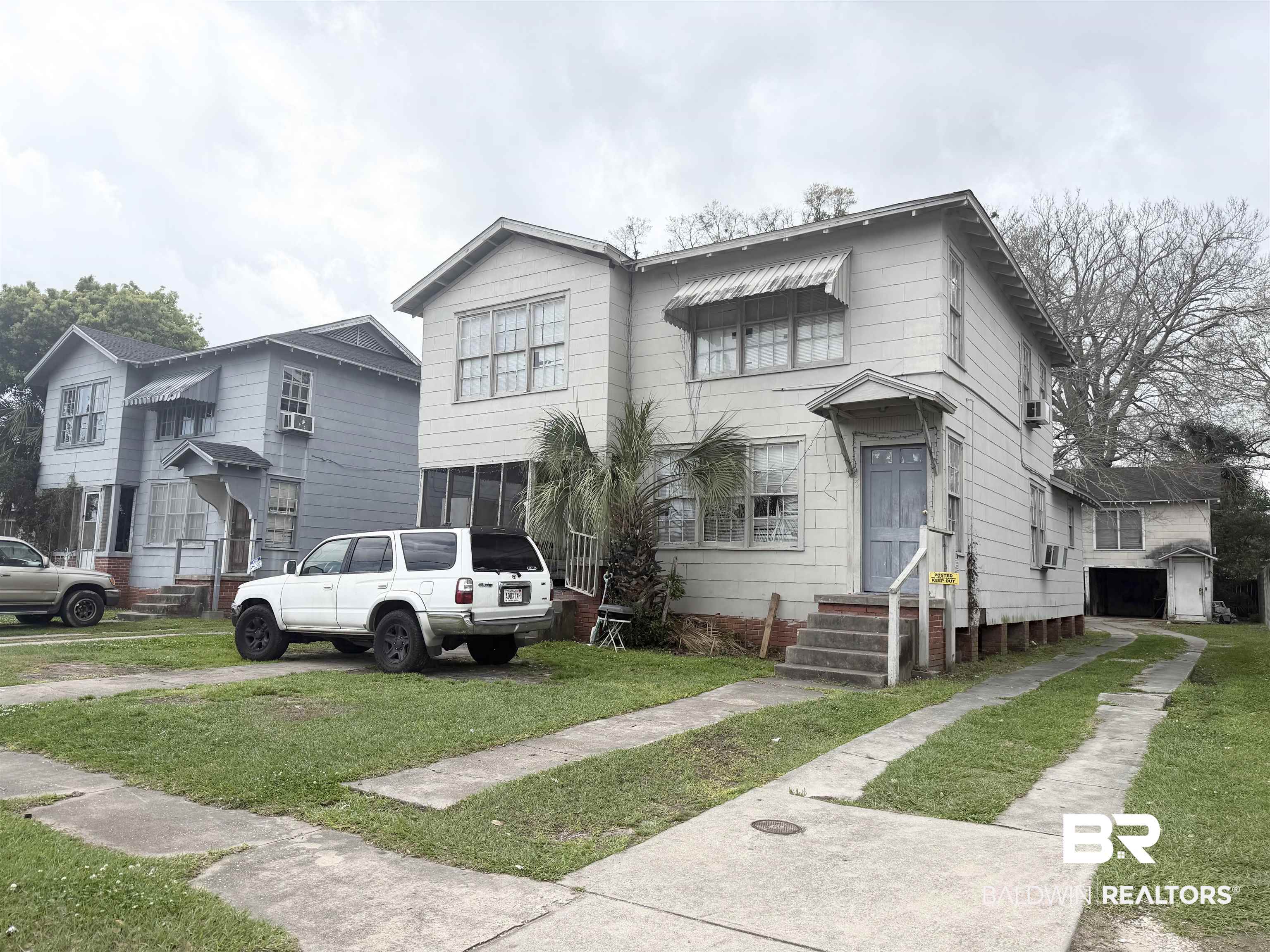 266 Rickarby Street Mobile, AL 36606 - Photo 3 of 4 View of front facade featuring a front lawn