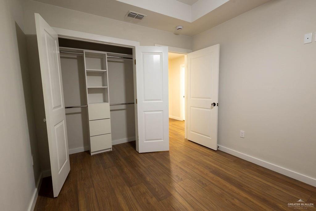 2209 Corales Street Mission, TX 78573 - Photo 21 of 30 wooden floor in an empty room