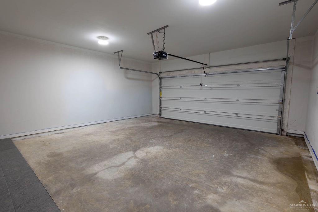 2209 Corales Street Mission, TX 78573 - Photo 26 of 30 a view of a room with wall cabinets and windows