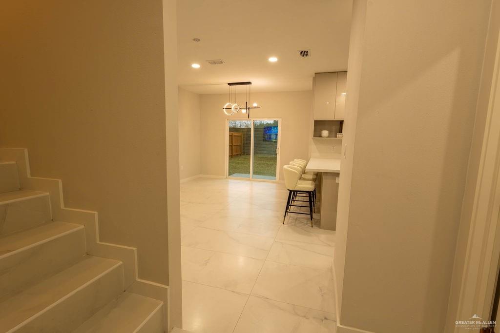 2209 Corales Street Mission, TX 78573 - Photo 27 of 30 a bathroom with a bathtub and a shower