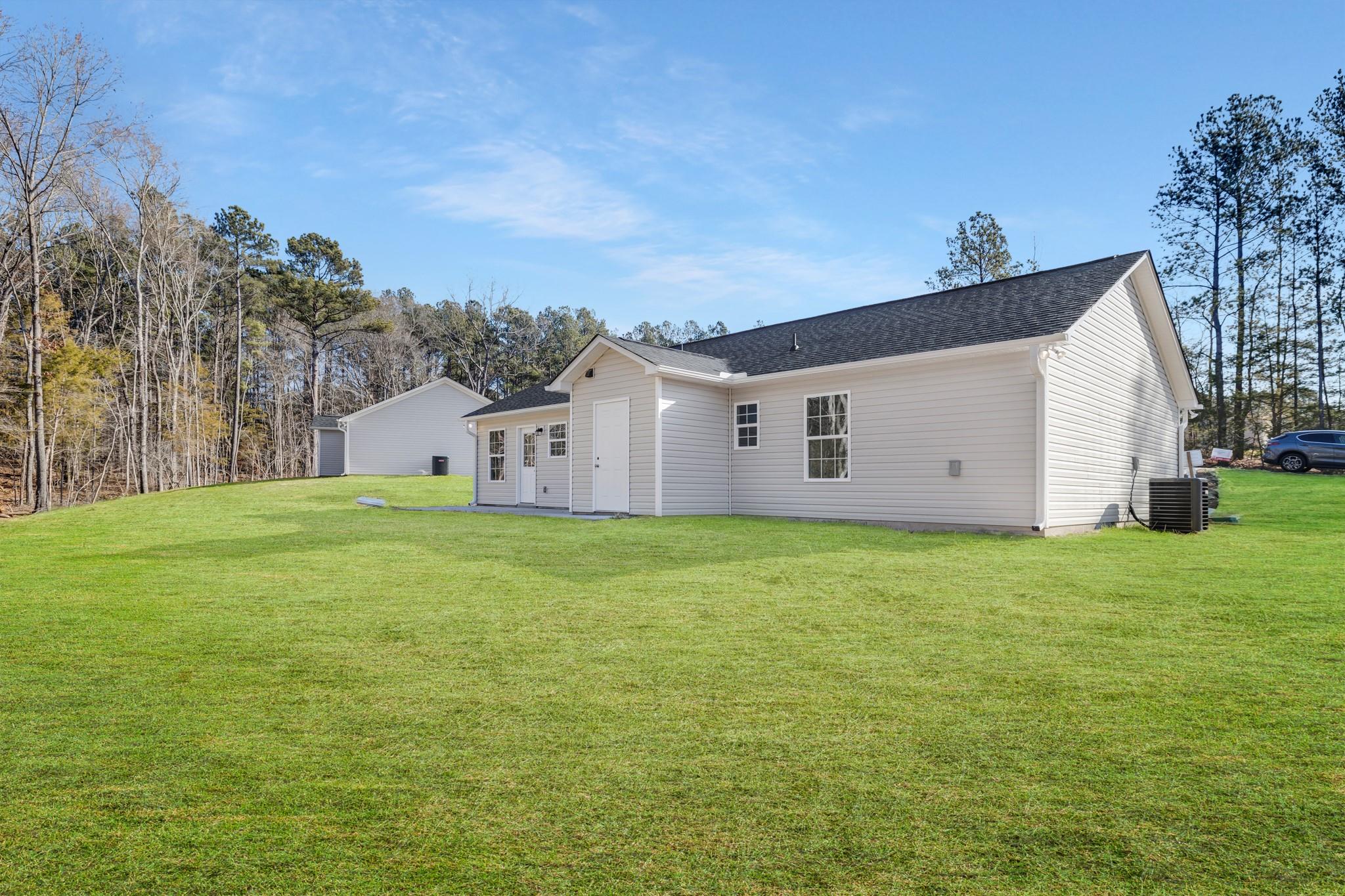 1076 Westminster Drive Lancaster, SC 29720 - Photo 18 of 19 a view of a house with backyard