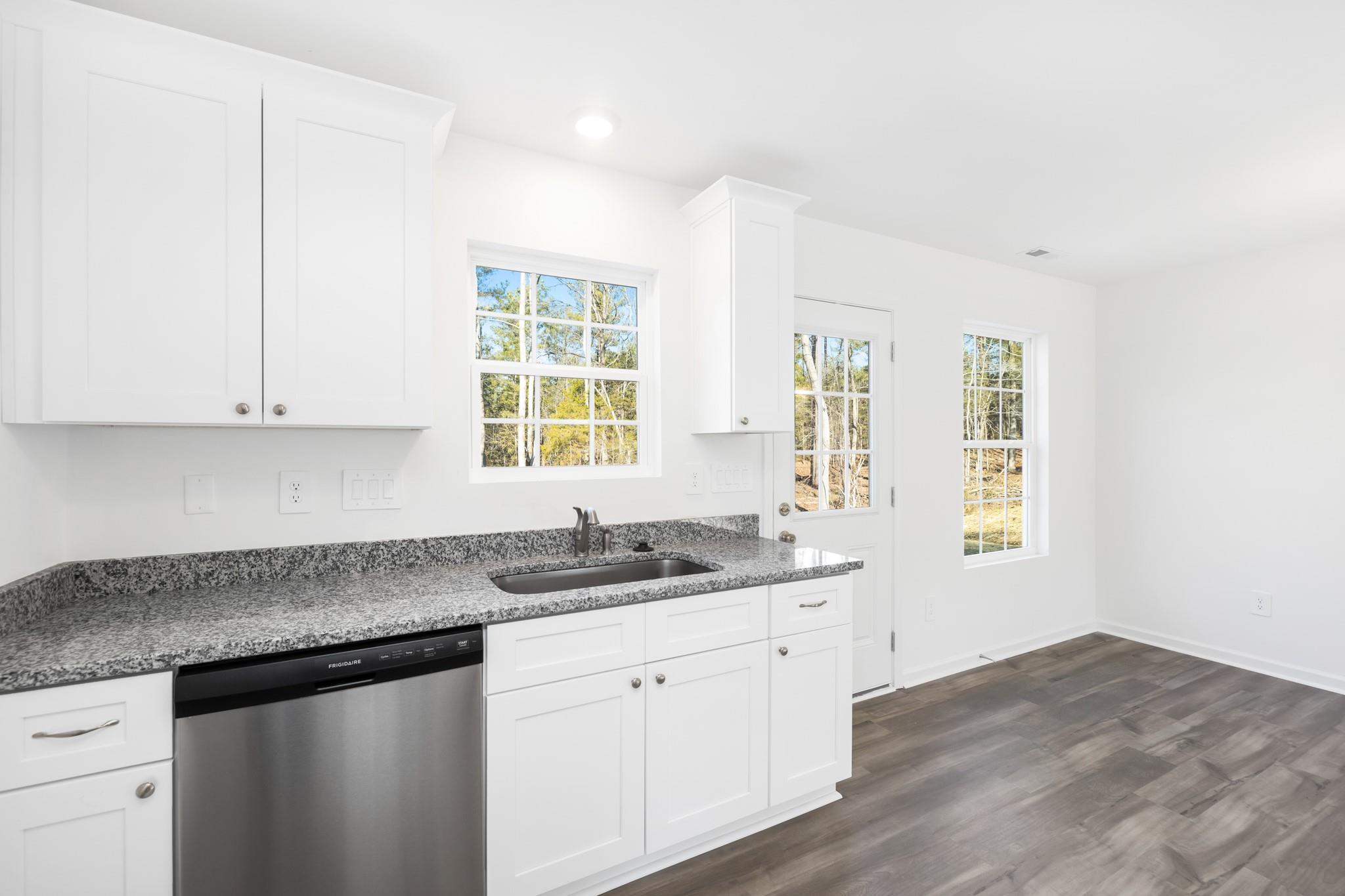 1076 Westminster Drive Lancaster, SC 29720 - Photo 8 of 19 a kitchen that has a sink and a stove
