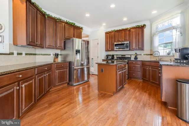 a view of fireplace and wooden floor
