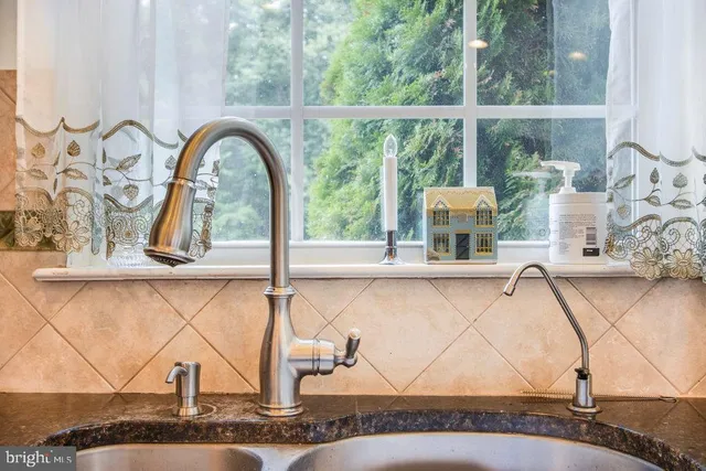 a bathroom with a toilet and a sink
