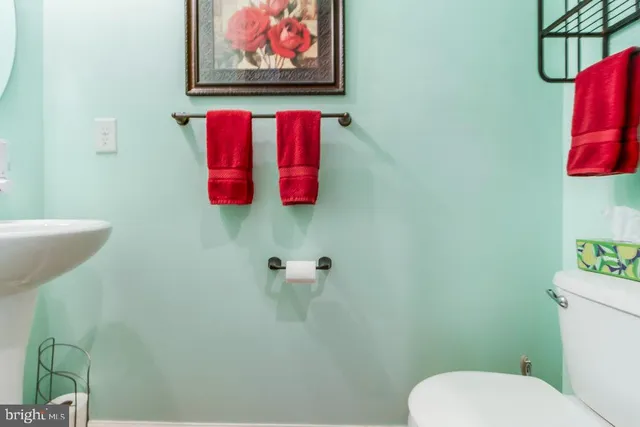 a bedroom with a bed and a table in it