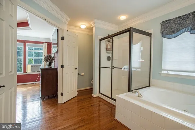 a view of a patio with a table chairs and a table