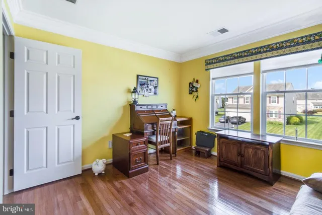 a view of a house with a yard and garage