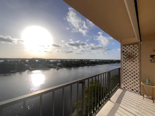 a view of a lake from a balcony