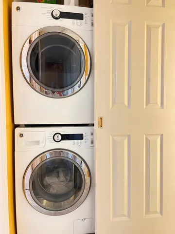 a bed room with a bed and a table