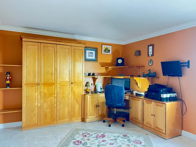 a view of kitchen with furniture and window