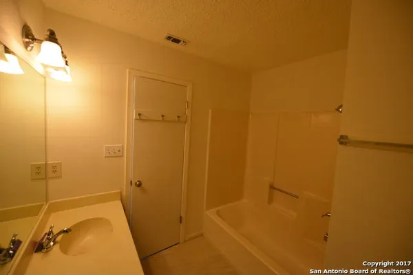 a bathroom with a tub
