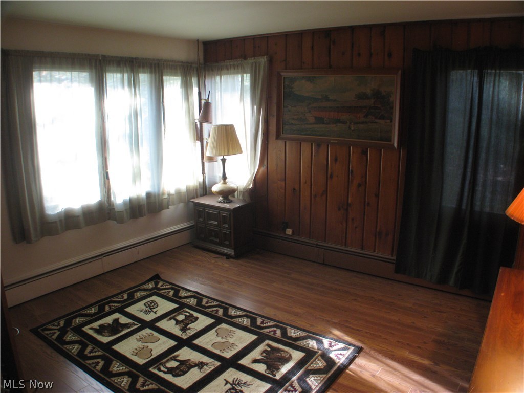 6921 Morley Road Painesville, OH 44077 - Photo 7 of 17 Mater bedroom with back yard and creek views.