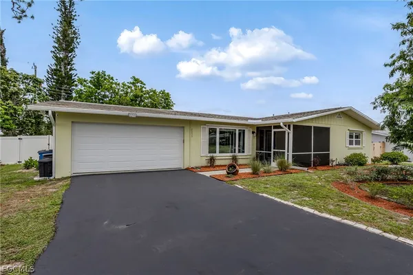 a front view of a house with patio