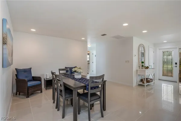 a view of a dining room with furniture