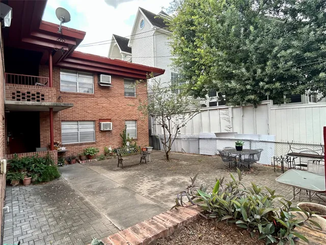 a view of a cafe with sitting area and furniture