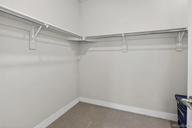 a view of an empty walk in closet