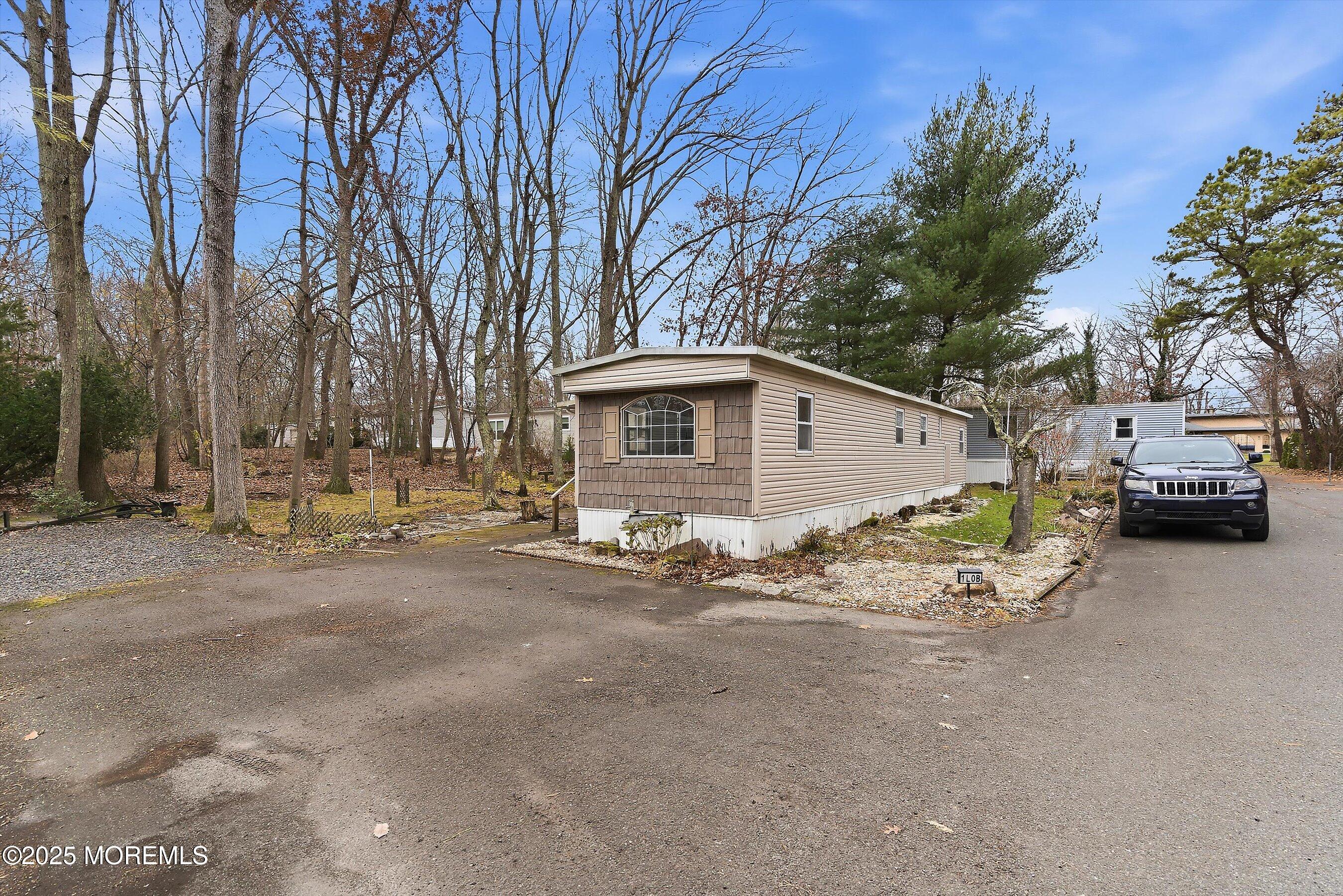 1 Loblolly Lane Jackson, NJ 08527 - Photo 15 of 19 a view of a house with a patio