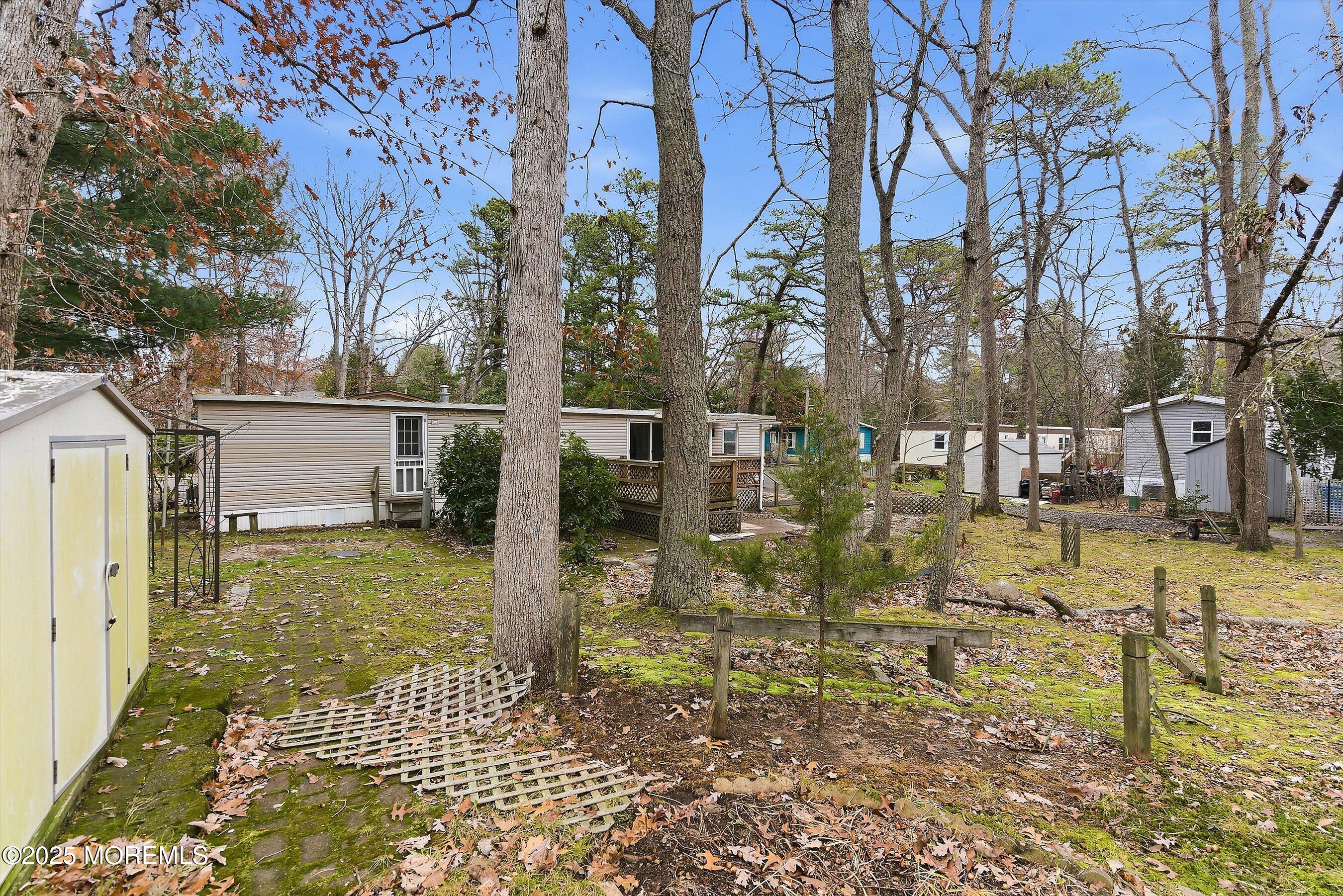 1 Loblolly Lane Jackson, NJ 08527 - Photo 18 of 19 a view of a yard with fountain