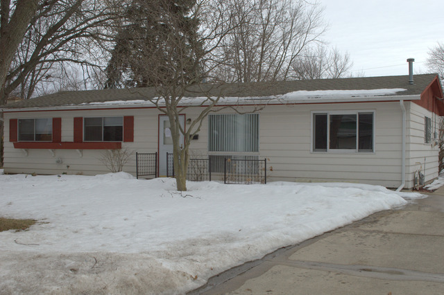 25 Marnel Road Montgomery, IL 60538 - Photo 1 of 22 a front view of a house with a yard and garage