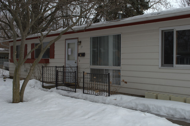 25 Marnel Road Montgomery, IL 60538 - Photo 2 of 22 a view of a house with a wooden fence