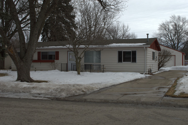 25 Marnel Road Montgomery, IL 60538 - Photo 3 of 22 a front view of a house with a yard and garage